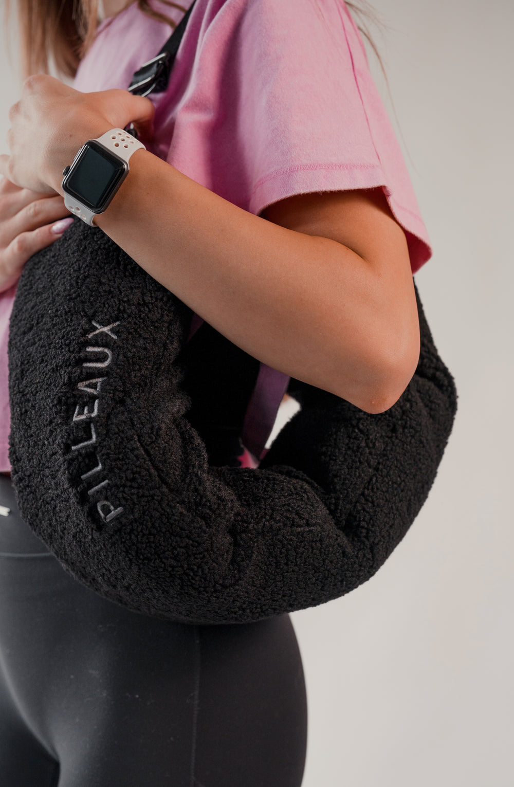 Bouclé Neck Pillow - pack your clothes inside