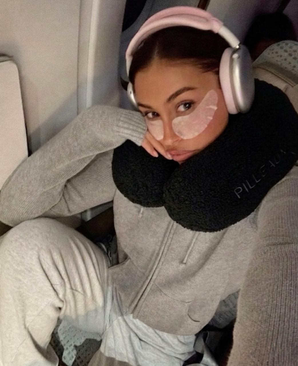 Bouclé Neck Pillow - pack your clothes inside